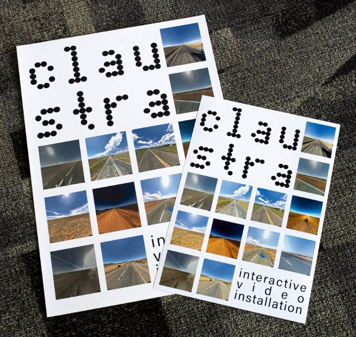 Two printed Claustra posters with a grid of road photographs.